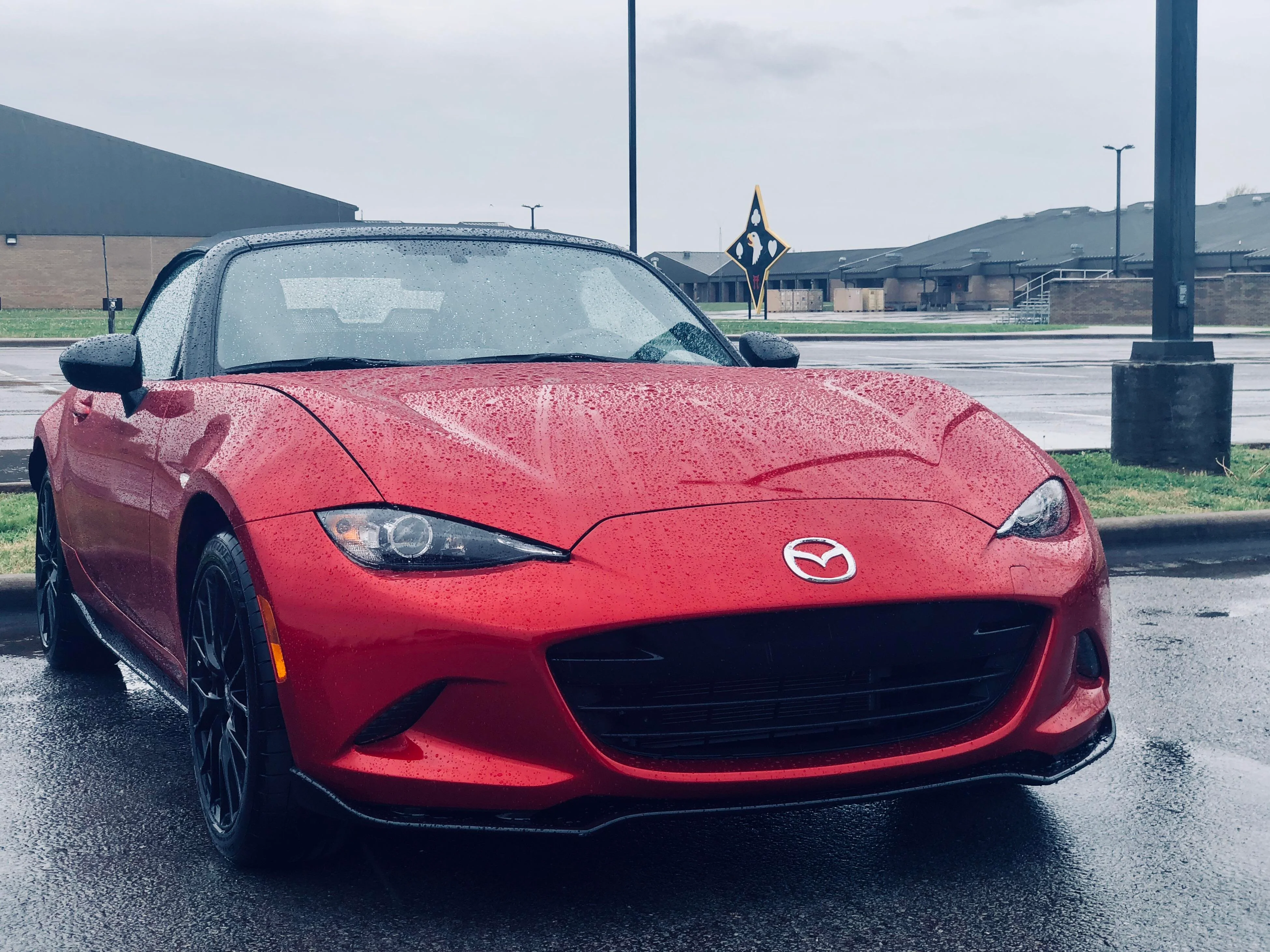 Red car on gloomy day